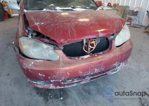 2003 Toyota Corolla Le z USA, uszkodzony, nr VIN 2T1BR32E13C066883